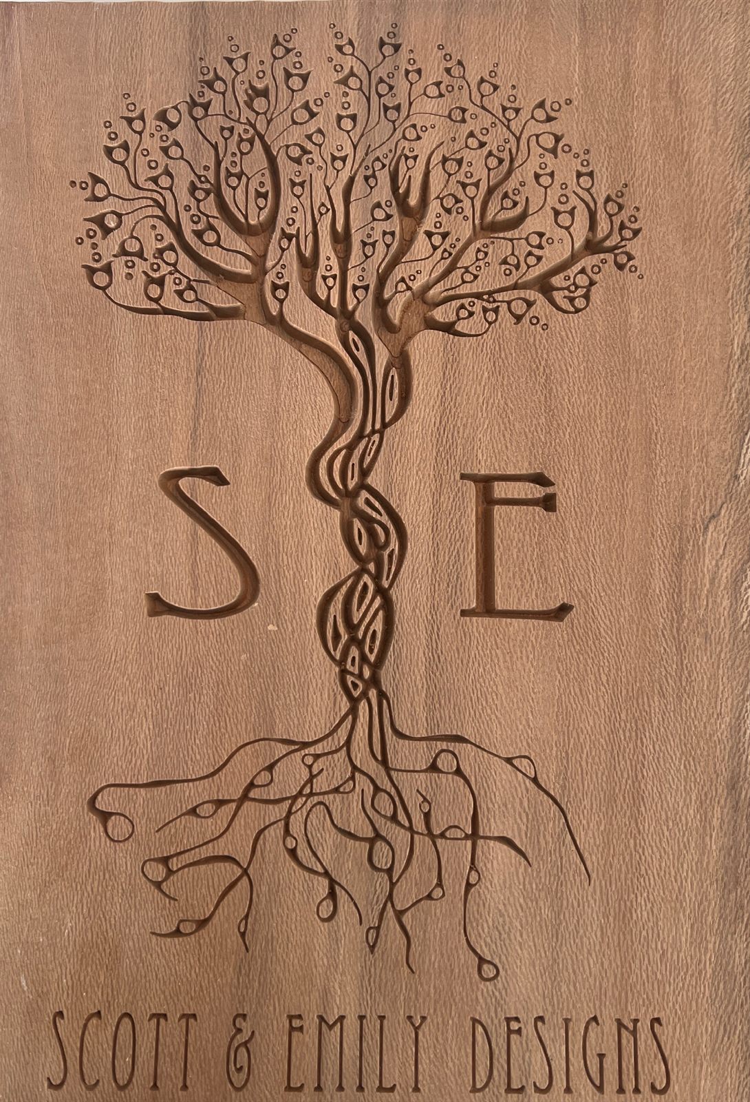 Our mark, carved in sycamore
